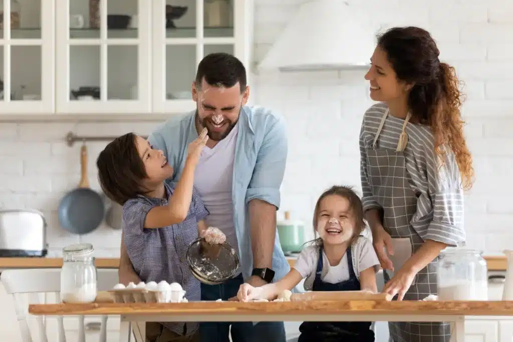 family having fun in the kitchen